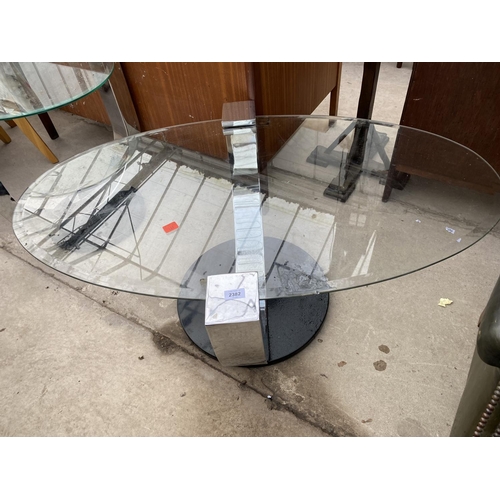 2382 - A RETRO GLASS OVAL OCCASIONAL TABLE ON CHROME U-FRAME WITH BLACK BASE, 46X26