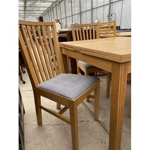 2392 - AN 'IKEA NORRNAS' DRAW-LEAF DINING TABLE AND FOUR CHAIRS