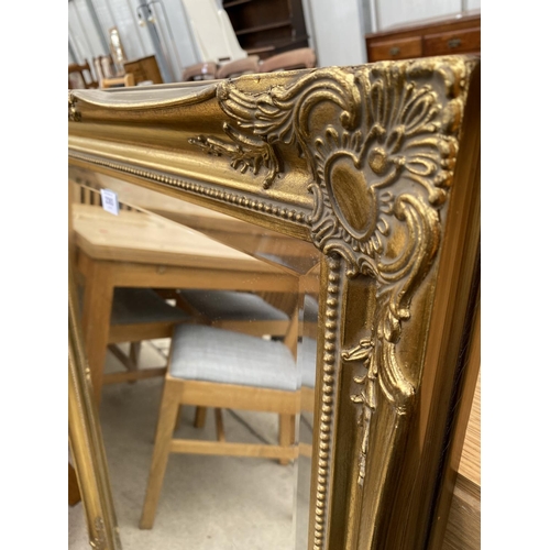 2393 - A GILT FRAMED 'THE GALLERY' WALL MIRROR WITH BEVEL EDGE, 42X30