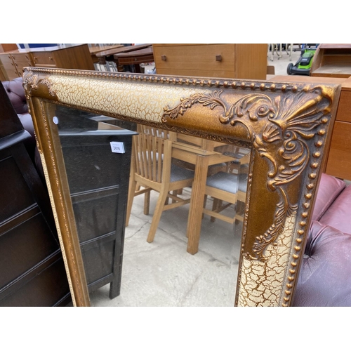 2416 - A GILT FRAMED WALL MIRROR WITH BEVEL EDGE, 42X30