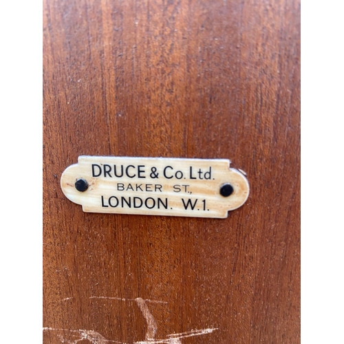 2433 - A RETRO OAK TWO DOOR WARDROBE BEARING LABEL, DRUCE & CO. LTD, BAKER STREET, LONDON, W1, 36