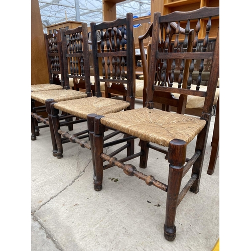 2434 - A HARLEQUIN SET OF ELM SPINDLE BACK 18TH CENTURY DINING CHAIRS WITH RUSH SEATS