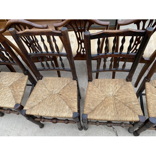 2434 - A HARLEQUIN SET OF ELM SPINDLE BACK 18TH CENTURY DINING CHAIRS WITH RUSH SEATS