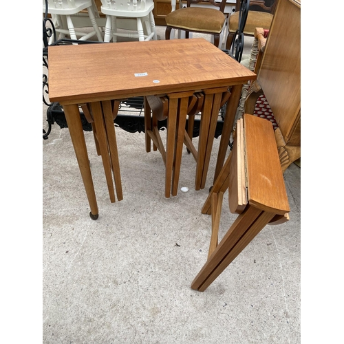 2454 - A RETRO TEAK NEST OF FIVE TABLES, FOUR BEING DROP-LEAF, 15