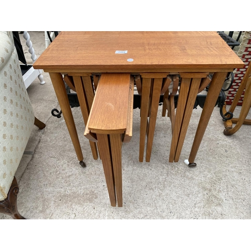 2454 - A RETRO TEAK NEST OF FIVE TABLES, FOUR BEING DROP-LEAF, 15