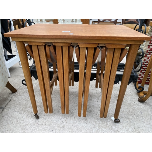 2454 - A RETRO TEAK NEST OF FIVE TABLES, FOUR BEING DROP-LEAF, 15