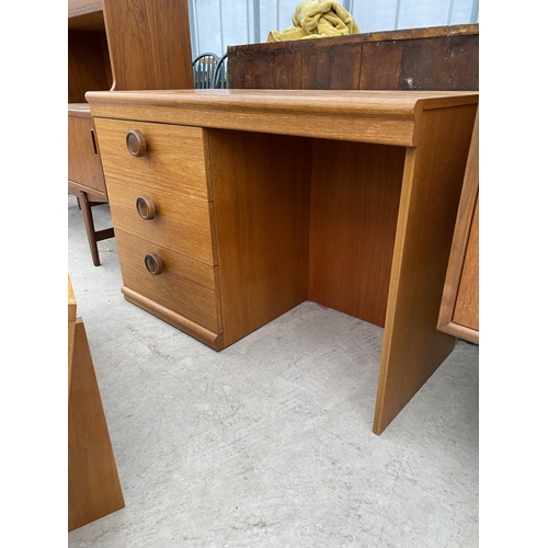 2462 - A RETRO TEAK SINGLE PEDESTAL DRESSING TABLE ENCLOSING THREE DRAWERS, 38