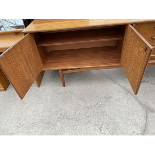 2463 - A RETRO TEAK G-PLAN SIDEBOARD ENCLOSING FOUR DRAWERS AND THREE CUPBOARDS, 81