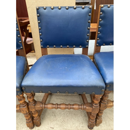 2479 - A SET SEVEN EARLY 20TH CENTURY JACOBEAN STYLE DINING CHAIRS WITH STUDDED BLUE UPHOLSTERY ON TURNED L... 