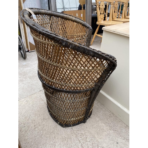 2494 - A RATTAN CONSERVATORY CHAIR WITH CRISS-CROSS PATTERNING