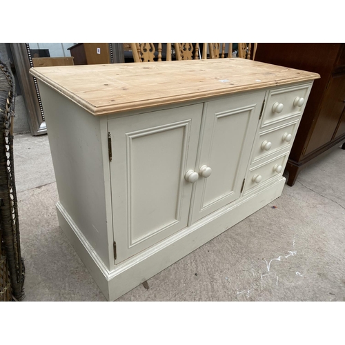 2495 - A PAINTED PINE SIDE CABINET ENCLOSING THREE DRAWERS AND TWO CUPBOARDS, 42