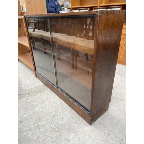 2505 - A 20TH CENTURY GLAZED BOOKCASE WITH TWO SLIDING DOORS, 42