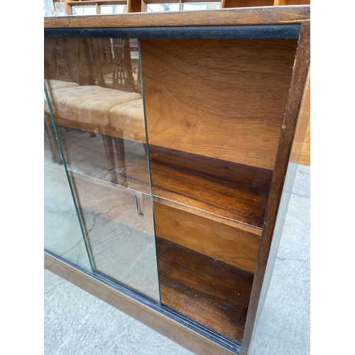 2505 - A 20TH CENTURY GLAZED BOOKCASE WITH TWO SLIDING DOORS, 42