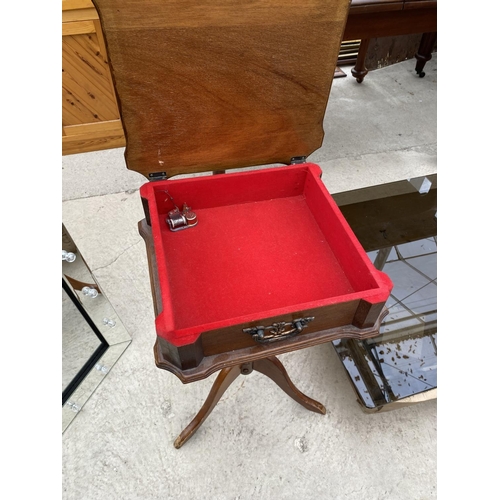 2507 - A MODERN MUSICAL TABLE WITH LIFT-UP LID, ON TRIPOD BASE