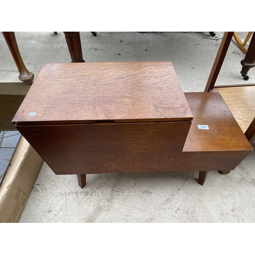 2509 - AN OAK 'VANSON' STEPPED SEWING BOX WITH LIFT-UP LID AND TWO DRAWERS