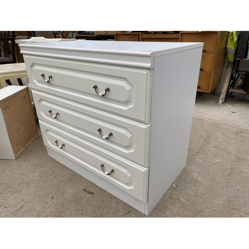 2523 - A MODERN WHITE CHEST OF THREE DRAWERS, 31