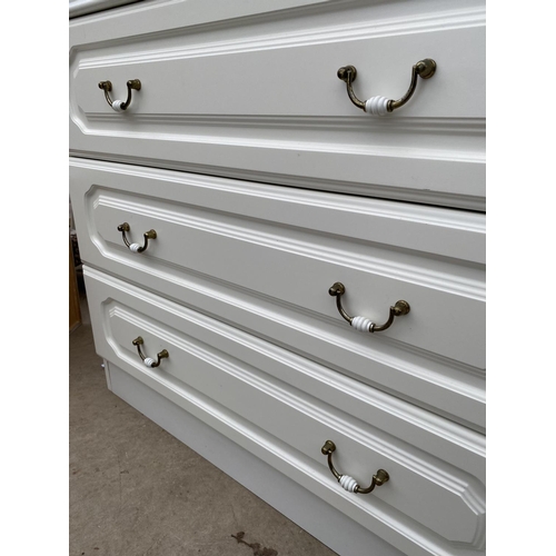 2523 - A MODERN WHITE CHEST OF THREE DRAWERS, 31