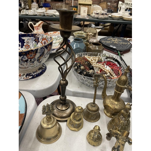 260 - A QUANTITY OF BRASSWARE TO INCLUDE A CANDLESTICK, FIGURES, BELL, AFTABA WATER PITCHER, ETC.,