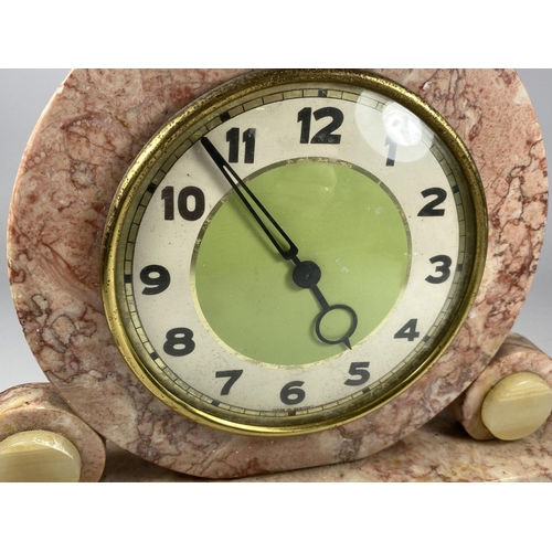 31 - AN ART DECO PINK MARBLE GERMAN MANTLE CLOCK