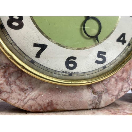 31 - AN ART DECO PINK MARBLE GERMAN MANTLE CLOCK