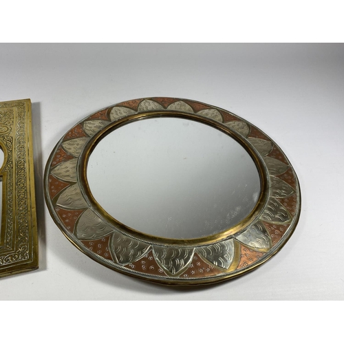 32 - TWO MIDDLE EASTERN MIRRORS TO INCLUDE A COPPER AND WHITE METAL EXAMPLE