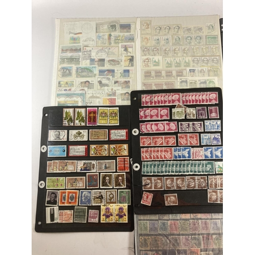 353 - A GROUP OF GERMAN STAMPS ON SHEETS