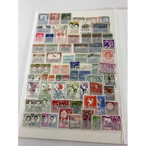 355 - A GROUP OF BELGIUM STAMPS ON SHEETS