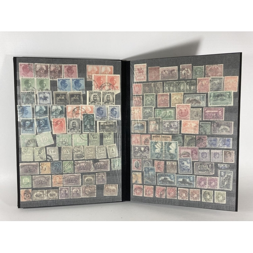 359 - A COLLECTION OF WORLD STAMPS IN BLACK ALBUM