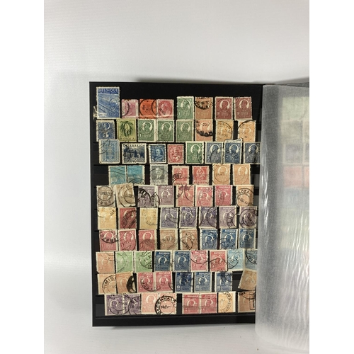 359 - A COLLECTION OF WORLD STAMPS IN BLACK ALBUM