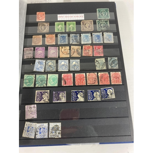 361 - AN AUSTRALIAN VICTORIAN STATES STAMPS IN BLUE ALBUM