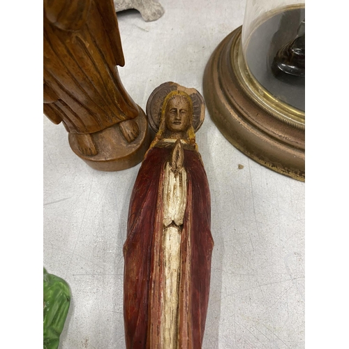 58 - TWO RELIGIOUS CARVED WOODEN ITEMS - PRAYING MAN & JESUS MODEL