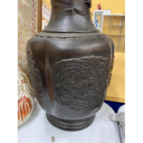 59 - A JAPANESE BRONZE TRUMPET FORM VASE WITH BIRD & FLORAL RELIEF MOULDED DESIGN, HEIGHT 46CM