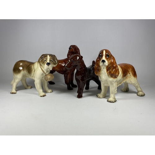 754 - A GROUP OF FOUR COOPERCRAFT CERAMIC DOG FIGURES