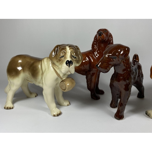 754 - A GROUP OF FOUR COOPERCRAFT CERAMIC DOG FIGURES