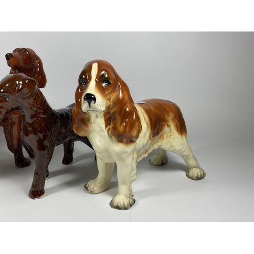 754 - A GROUP OF FOUR COOPERCRAFT CERAMIC DOG FIGURES