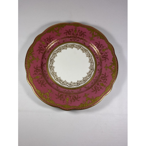 779 - A COALPORT GILT & PINK DESIGN CABINET PLATE