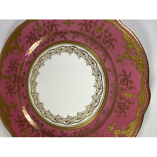 779 - A COALPORT GILT & PINK DESIGN CABINET PLATE