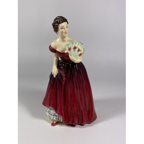 783 - A RADNOR CERAMIC LADY FIGURE IN RED DRESS