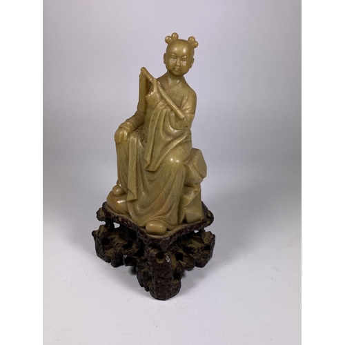 787 - AN ORIENTAL JADE STYLE FIGURE, HEIGHT 16CM