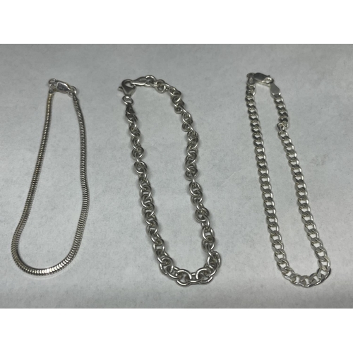 688 - A GROUP OF SIX ASSORTED SILVER BRACELETS