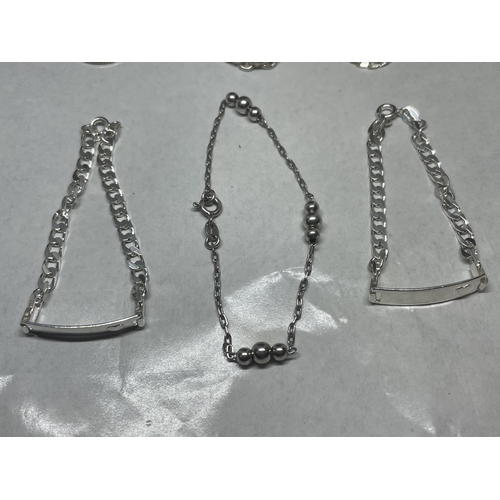 688 - A GROUP OF SIX ASSORTED SILVER BRACELETS