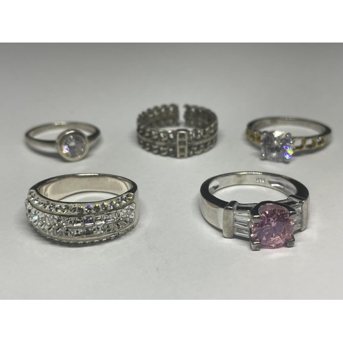 692 - A GROUP OF FIVE ASSORTED SILVER RINGS