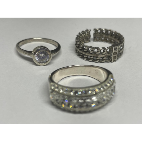 692 - A GROUP OF FIVE ASSORTED SILVER RINGS