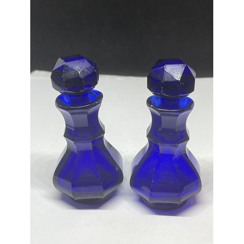 703 - A PAIR OF VINTAGE BRISTOL BLUE SCENT BOTTLES