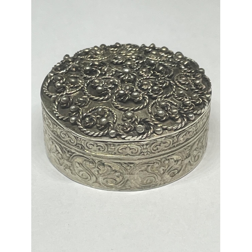 727 - A DECORATIVE .800 GRADE SILVER PILL BOX