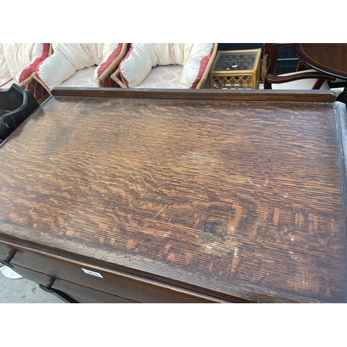 2619 - A MID 20TH CENTURY OAK TALLBOY, 33