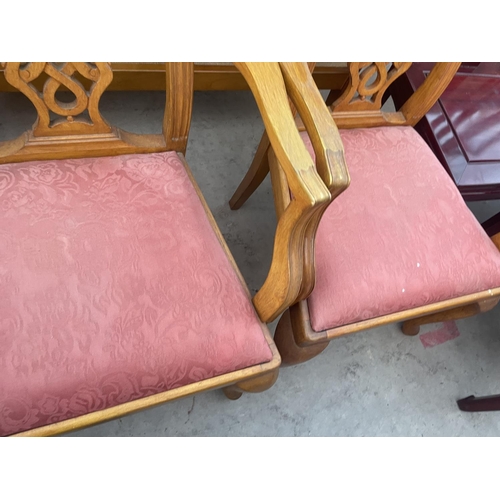 2623 - A PAIR PIERCED SPLAT BACK ELBOW CHAIRS