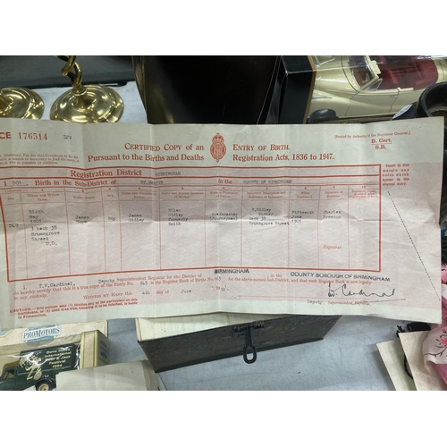 281 - A VINTAGE DEED TIN CONTAINING A QUANTITY OF BIRTH, DEATH AND MARRIAGE CERTIFICATES