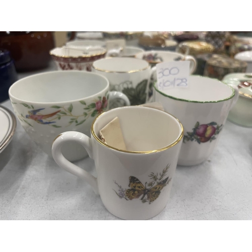 300 - A LARGE COLLECTION OF COLLECTABLE CUPS