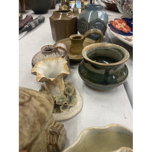 854 - A QUANTITY OF STUDIO POTTERY TO INCLUDE CANDLE HOLDERS, SMALL VASES, ETC.,